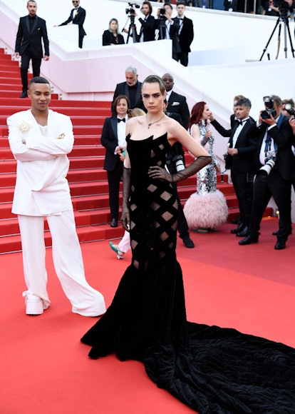 CANNES, FRANCE - MAY 24: Olivier Rousteing and Cara Delevingne attend the 75th Anniversary celebrati...