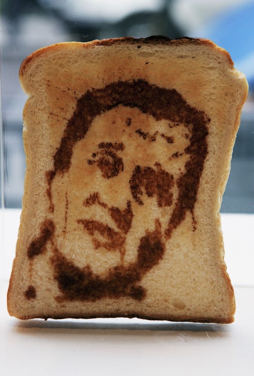 LONDON - OCTOBER 23:  A piece of toast with a portrait of Conservative leader David Cameron sits on ...