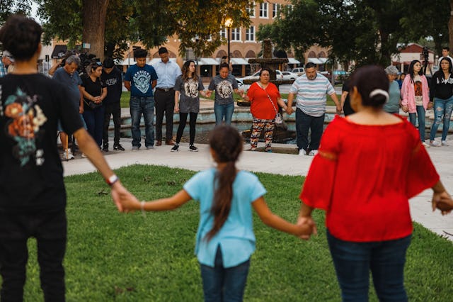 Members of the community gather at the City of Uvalde Town Square for a prayer vigil in the wake of ...