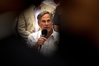 Texas Governor Greg Abbott, who has signed multiple pieces of gun-related legislation, speaks during...