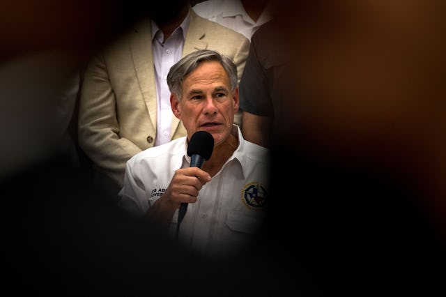 Texas Governor Greg Abbott, who has signed multiple pieces of gun-related legislation, speaks during...