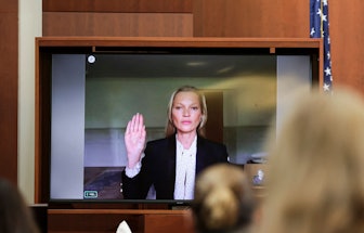 TOPSHOT - Model Kate Moss is sworn in via video link at the Fairfax County Circuit Courthouse in Fai...
