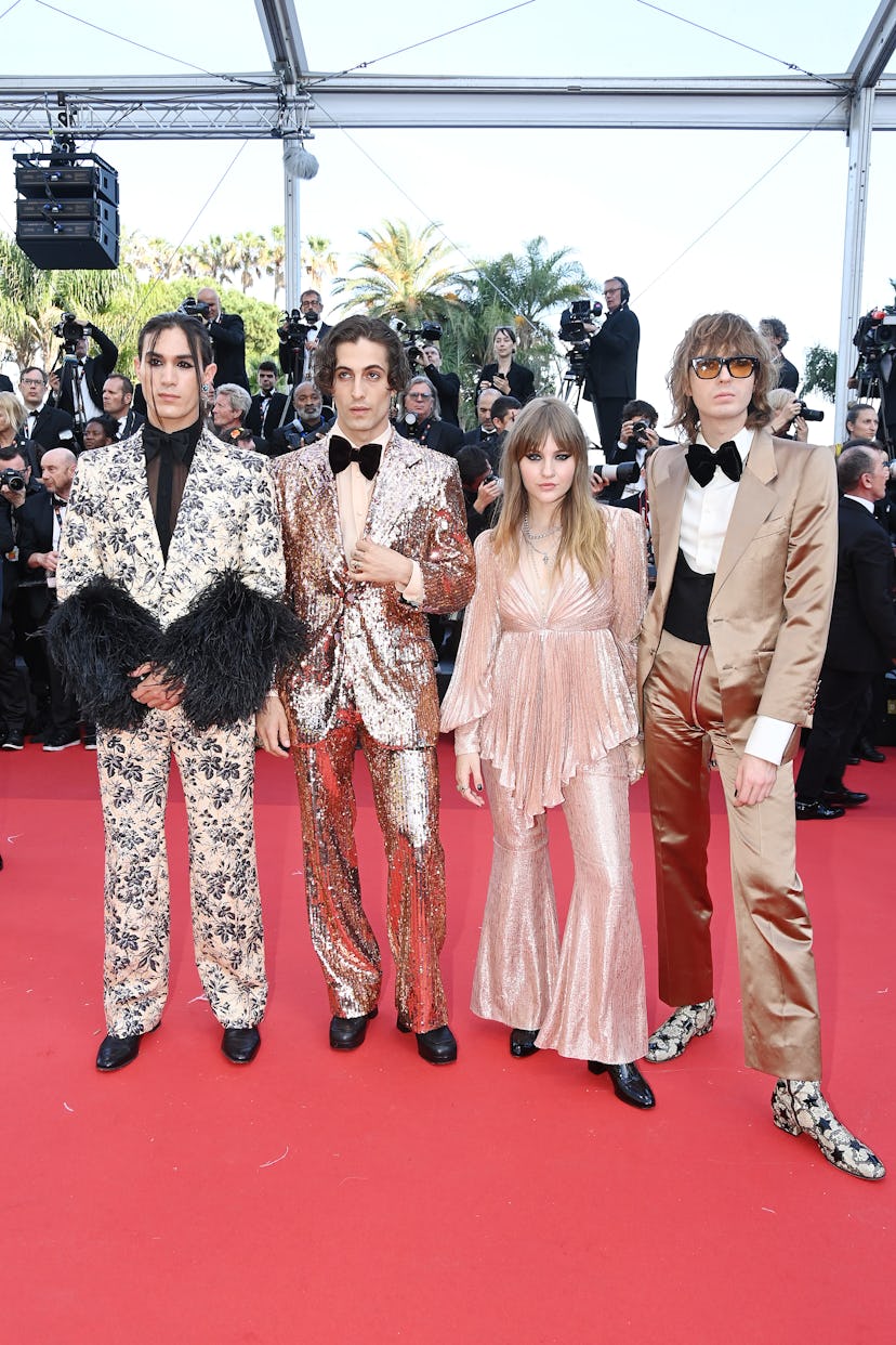 CANNES, FRANCE - MAY 25: (R to L) Maneskin : Thomas Raggi, Victoria De Angelis, Damiano David and Et...