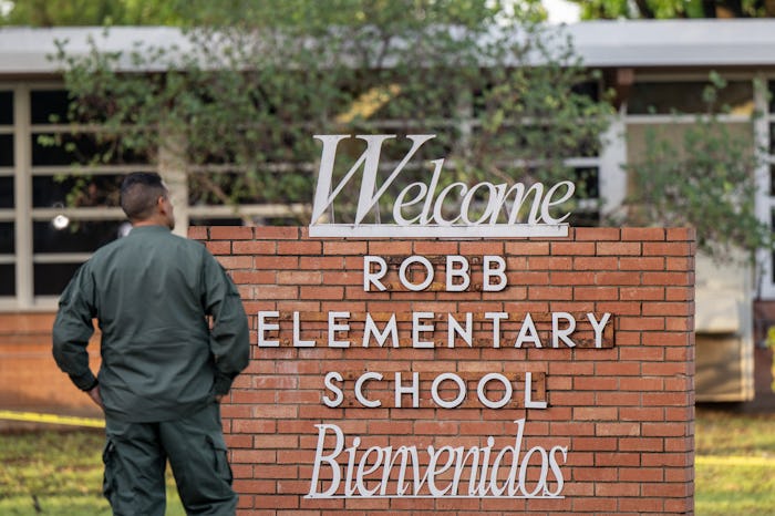 UVALDE, TEXAS - MAY 25: A law enforcement officer stands outside the Robb Elementary School on May 2...