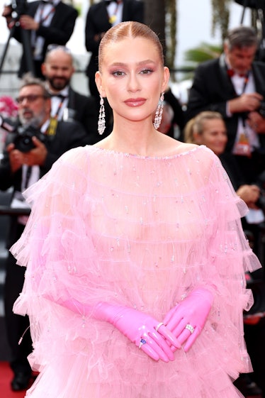 Marina Ruy Barbosa at the screening of Decision To Leave in Cannes in a pink gown with matching glov...