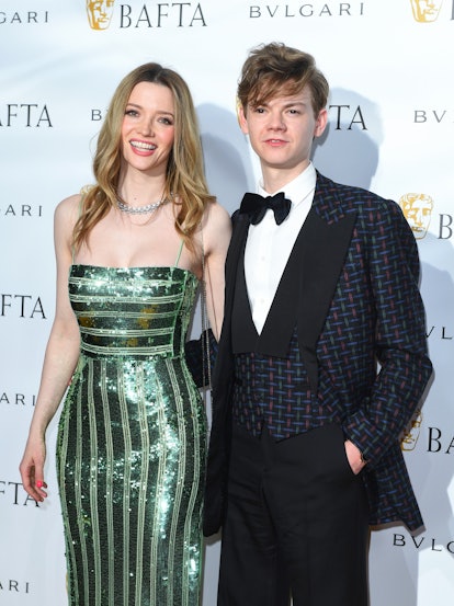 Talulah Riley and Thomas Brodie-Sangster attend the British Academy Film Awards 2022