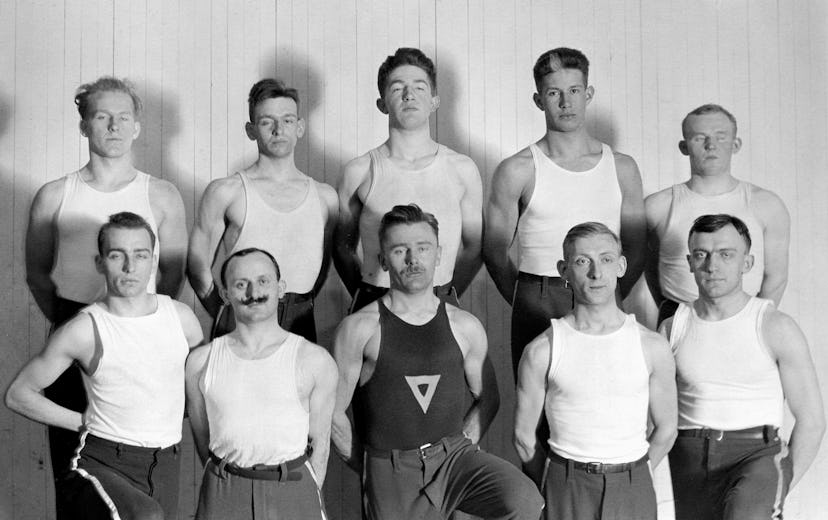 Rochester, NY gymnastics club wearing white tank tops in 1910s. 