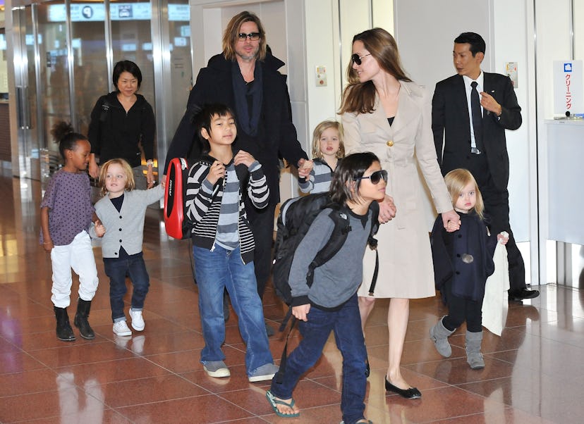 TOKYO, JAPAN - NOVEMBER 08: Brad Pitt, Angelina Jolie and their six children Maddox, Pax, Zahara, S…