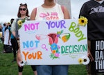 WASHINGTON, DISTRICT OF COLUMBIA, UNITED STATES - 2022/05/14: An abortion rights demonstrator holdin...