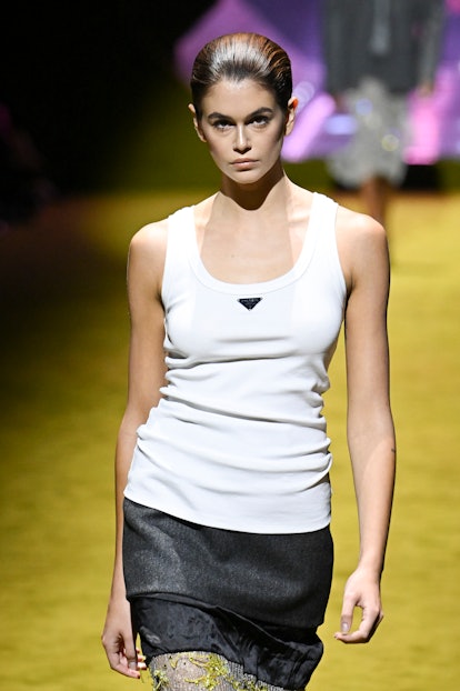 Kaia Gerber wearing a white tank top from Prada.