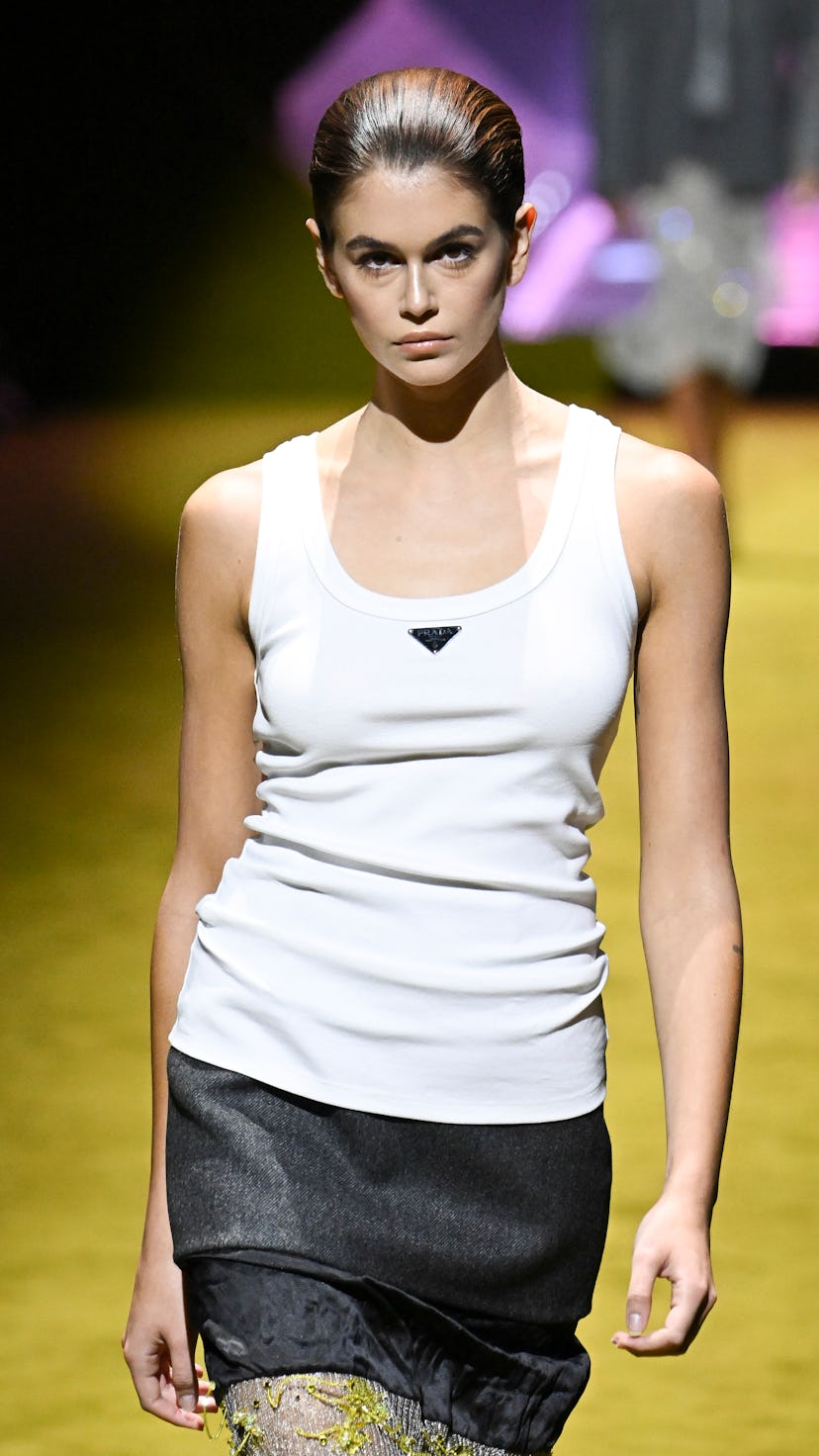 Kaia Gerber wearing a white tank top from Prada.