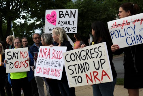 FAIRFAX, VIRGINIA - MAY 25: Gun-control advocates hold a vigil outside of the National Rifle Associa...