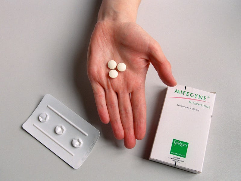 A nurse shows the RU486 pill at the family planning department of Hopital Broussais, 25 October 2000...