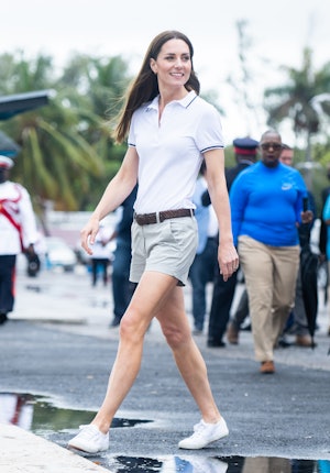 Kate Middleton wearing white Superga sneakers.
