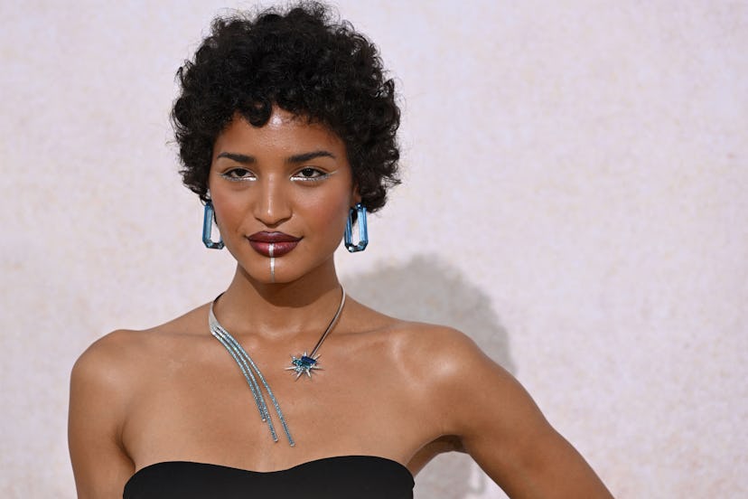 US actress Indya Moore arrives on May 26, 2022 to attend the annual amfAR Cinema Against AIDS Cannes...