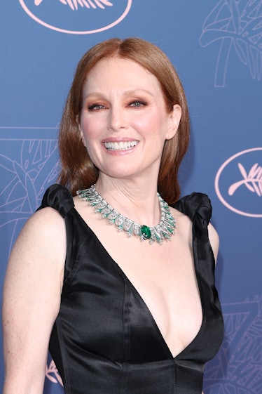 Julianne Moore at the opening ceremony gala dinner for the Cannes film festival in a black gown and ...