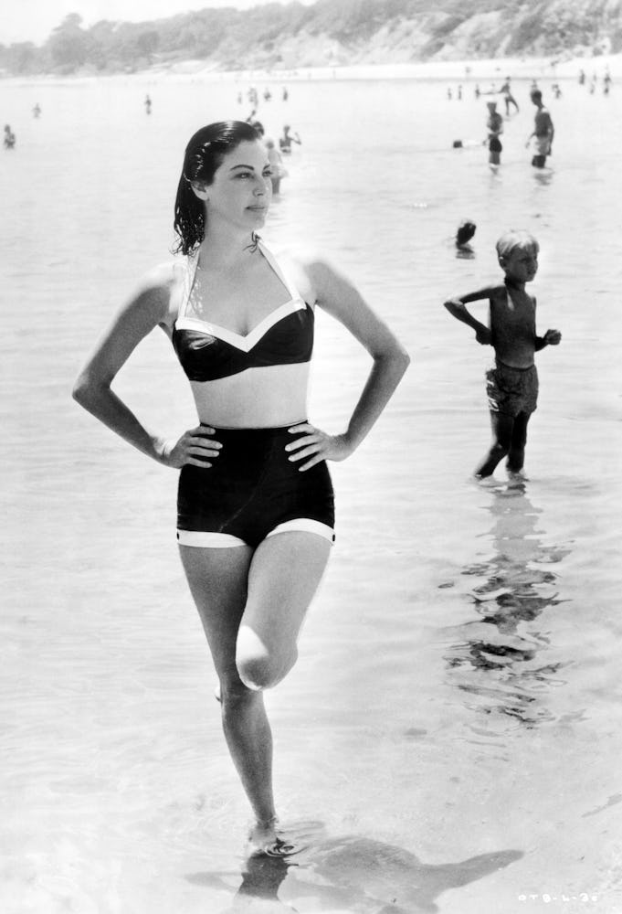 Actress Ava Gardner on the beach in a swimsuit