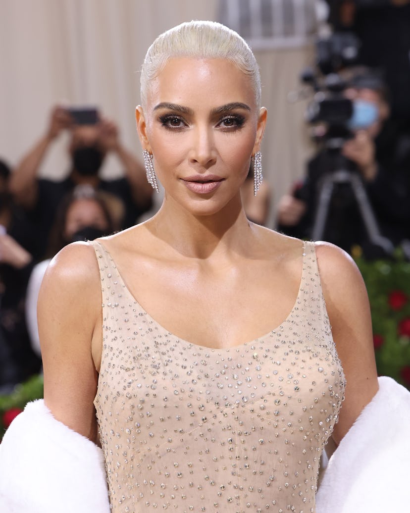 Kim Kardashian wears old Hollywood glamour makeup at the "In America: An Anthology of Fashion," the ...