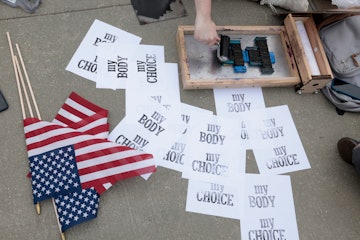 WASHINGTON, DC - MAY 03: Pro-choice demonstrators print signs in front of the U.S. Supreme Court Bui...