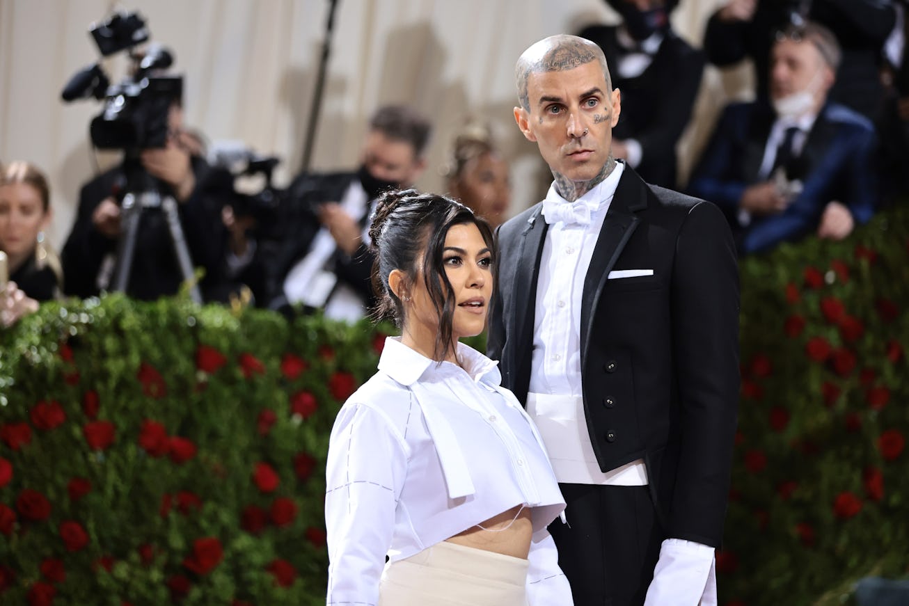 NEW YORK, NEW YORK - MAY 02: (L-R) Kourtney Kardashian and Travis Barker attend The 2022 Met Gala Ce...