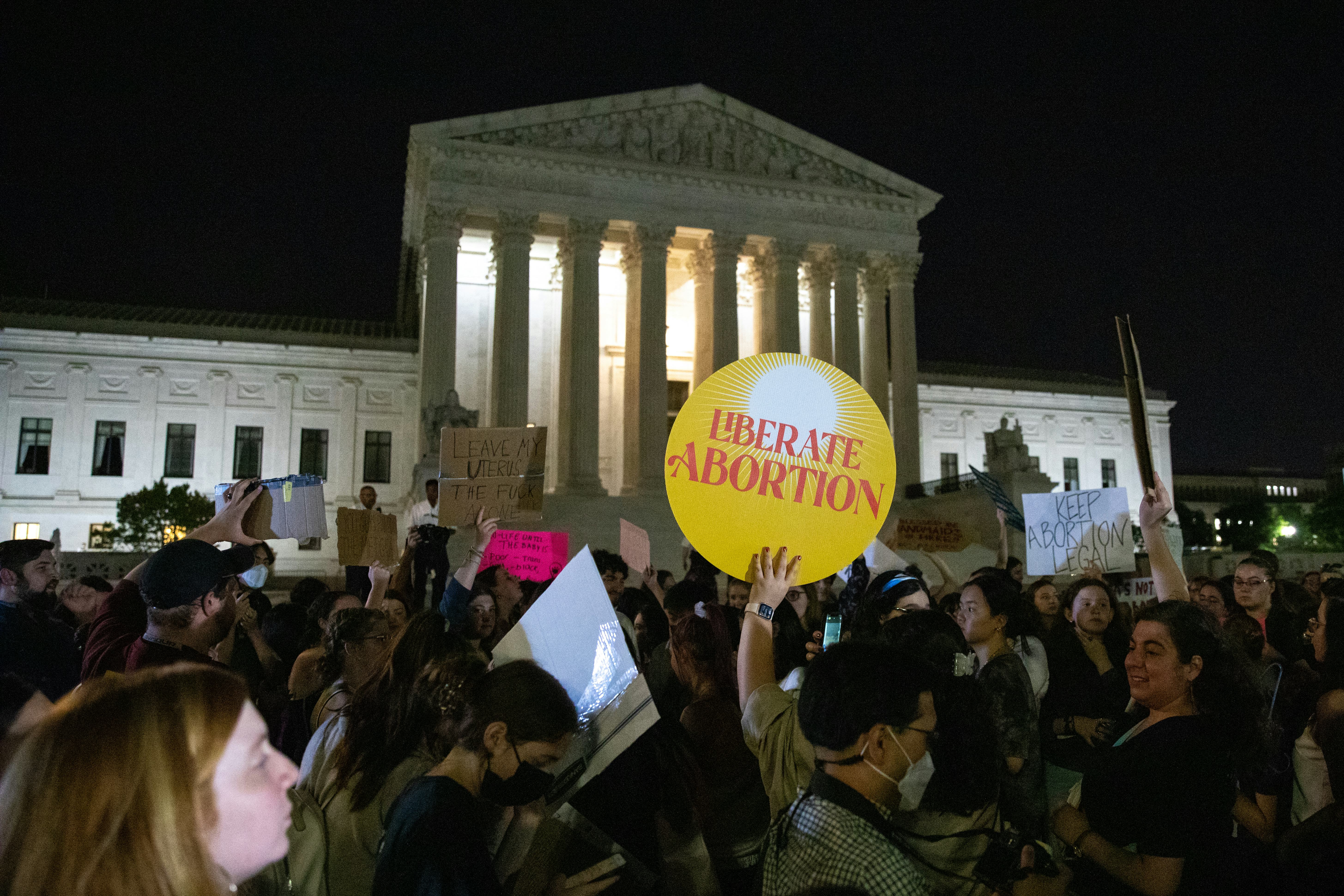 WASHINGTON, D.C. - May 2: Pro-choice and anti-abortion protesters gather in front of the Supreme Cou...