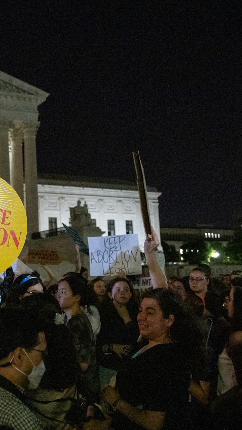 WASHINGTON, D.C. - May 2: Pro-choice and anti-abortion protesters gather in front of the Supreme Cou...