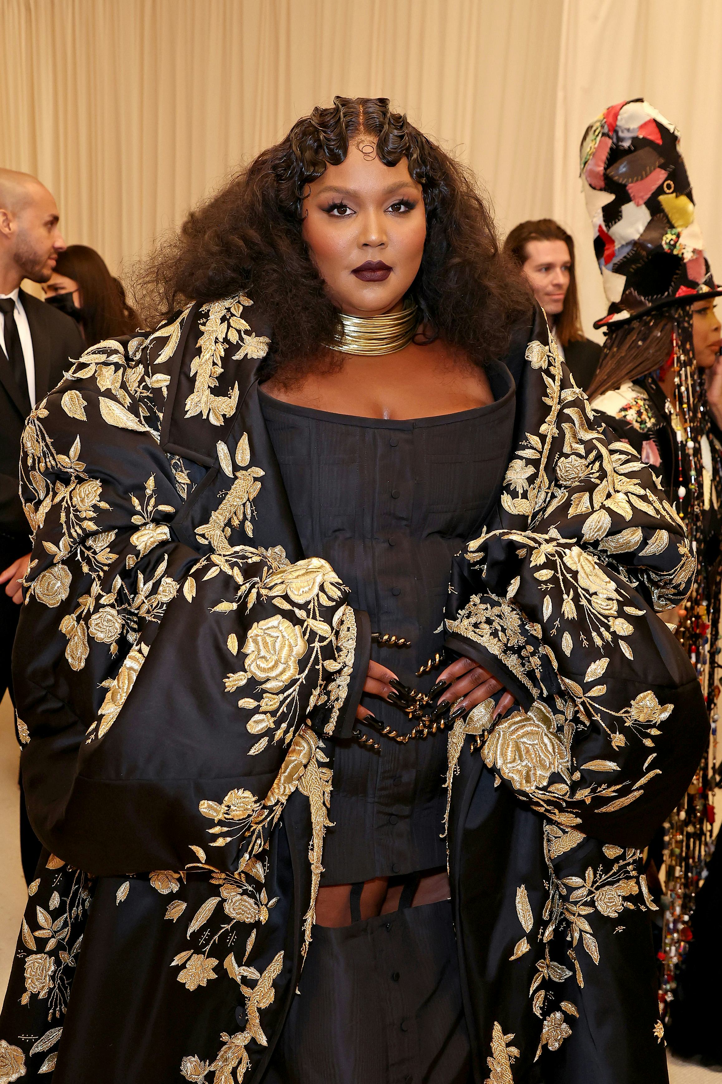 Lizzo wears a deep dark lipstick with matching smoky eye at the 2022 Met Gala Celebrating &ldquo;In Americ&hellip;