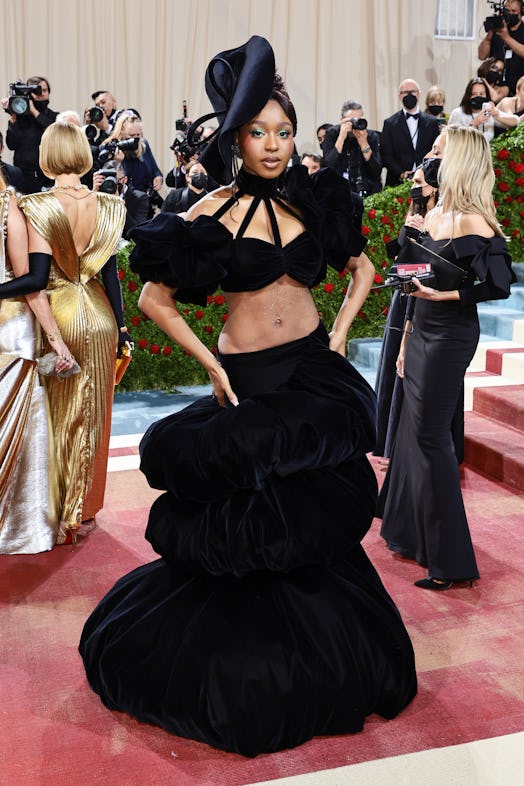 Normani attends The 2022 Met Gala Celebrating "In America: An Anthology of Fashion" in a crop top an...