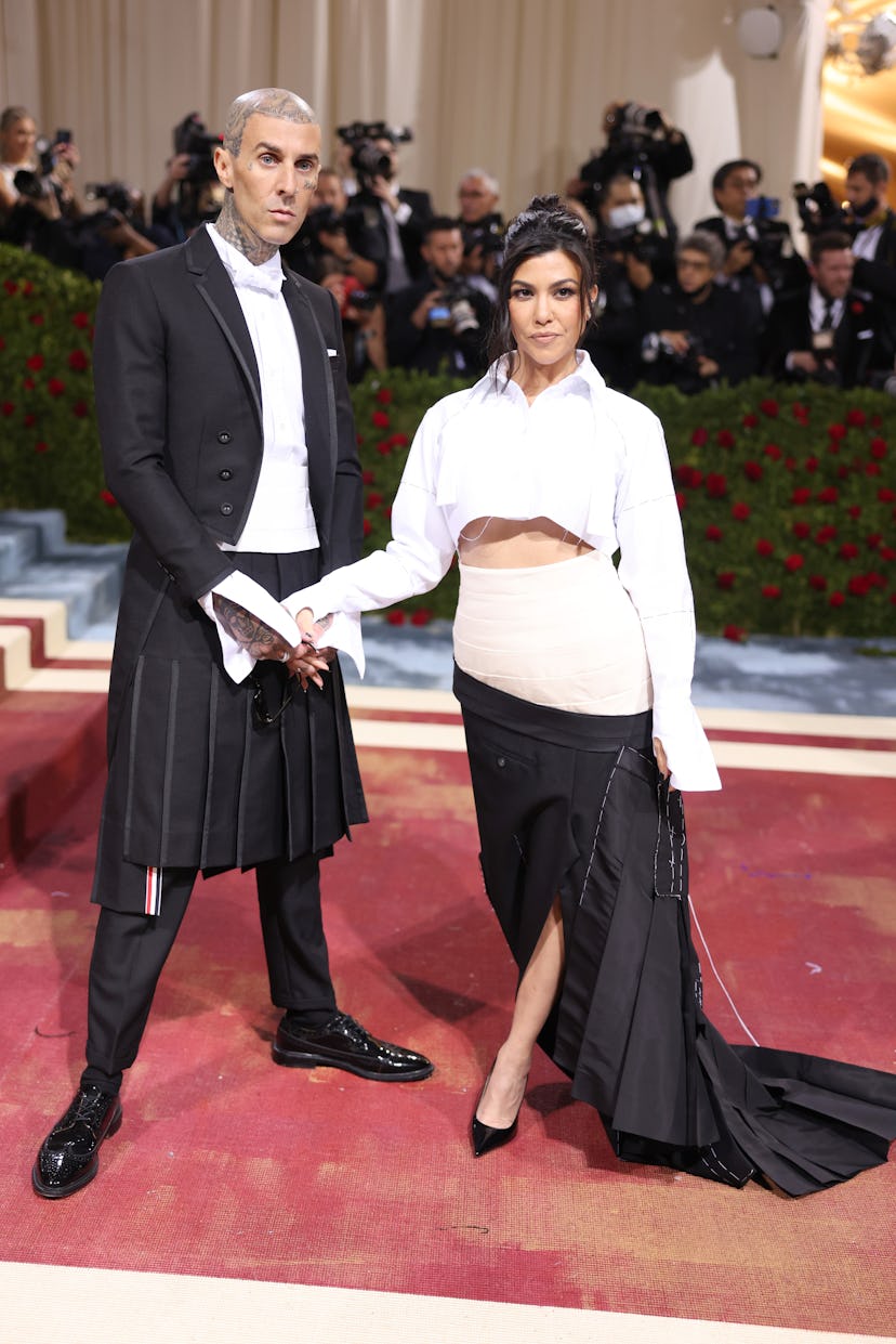 NEW YORK, NEW YORK - MAY 02: (L-R) Travis Barker and Kourtney Kardashian attends The 2022 Met Gala C...