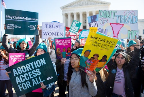 Pro-choice activists supporting legal access to abortion protest during a demonstration outside the ...