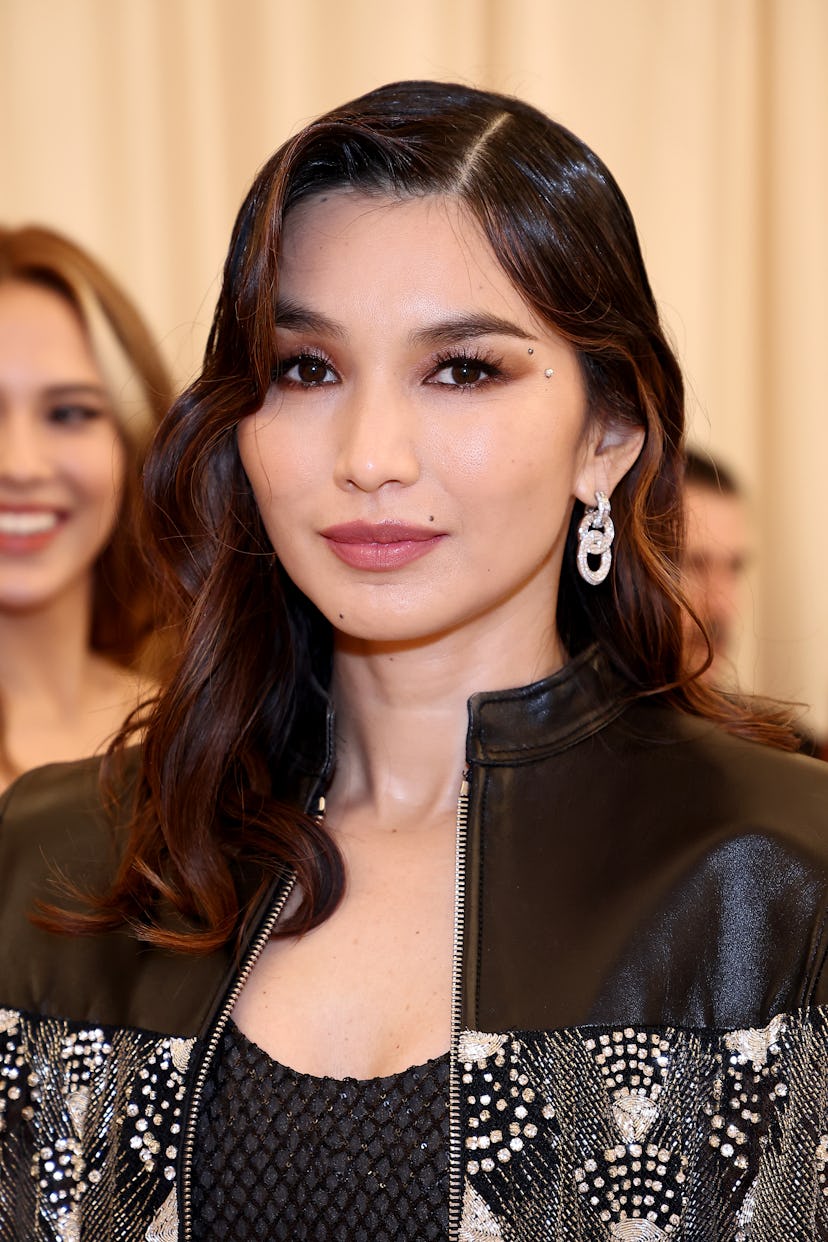 Gemma Chan wears a smoky eye and subtle face jewels at The 2022 Met Gala Celebrating "In America: An...