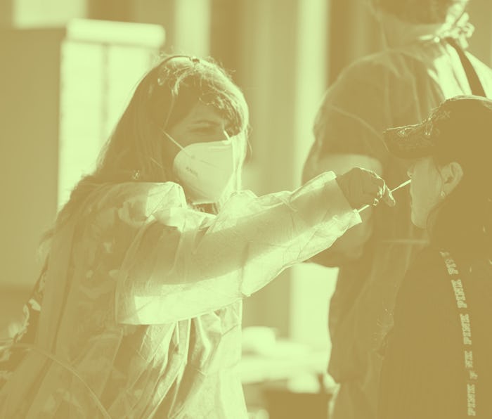 SAN DIEGO, CALIFORNIA - MARCH 29: A fan is swabbed at the COVID-19 testing site prior to opening nig...