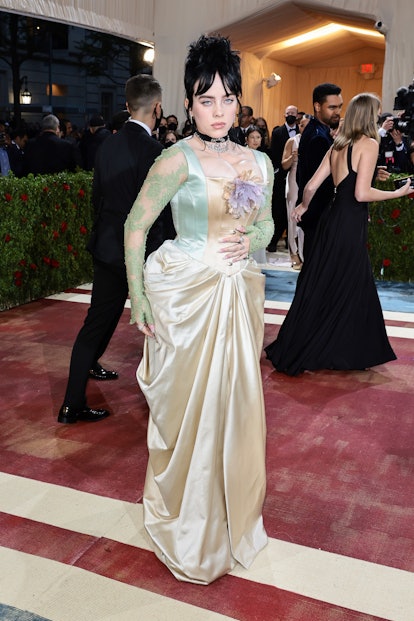 Billie Eilish attends The 2022 Met Gala Celebrating in a corset gown that's giving bridgerton boob
