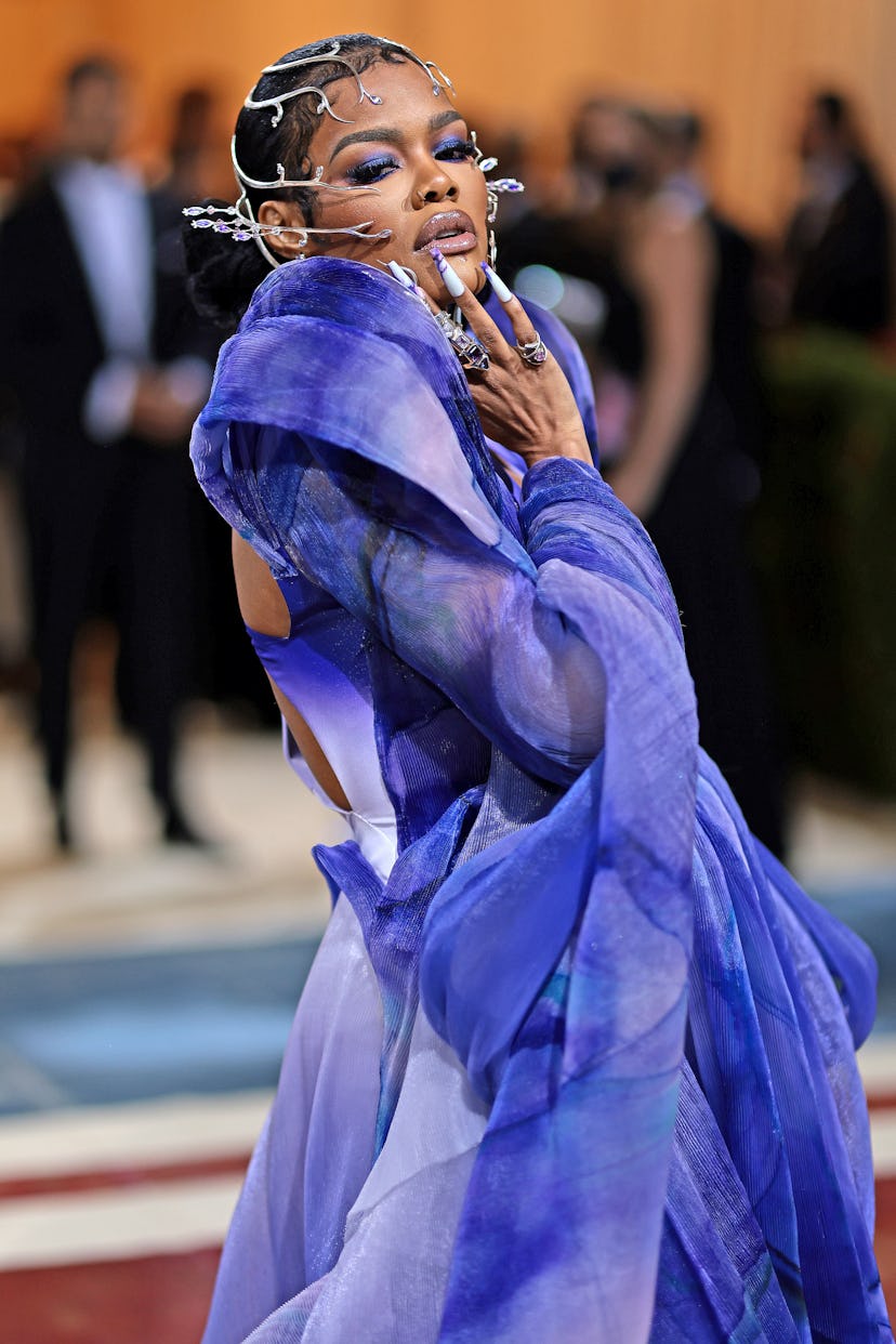 Teyana Taylor’s Met Gala hairstyle featured gilded accents.