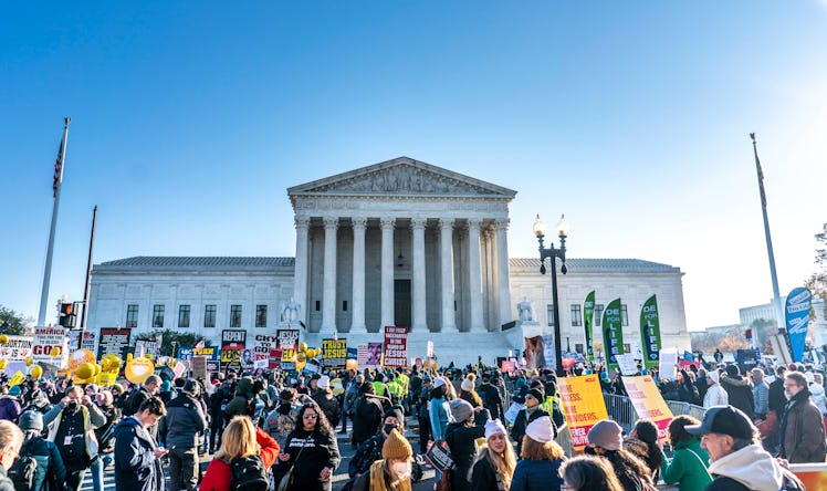 WASHINGTON, DC - DECEMBER 1, 2021: Antiabortion and abortion rights advocates protest outside the US...