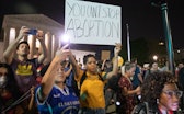 WASHINGTON, D.C. - May 2: Pro-choice protesters rally in front of the Supreme Court after news broke...
