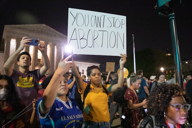 WASHINGTON, D.C. - May 2: Pro-choice protesters rally in front of the Supreme Court after news broke...