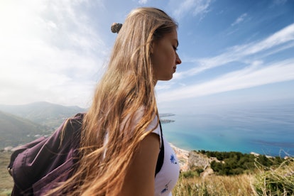 Teenage girl is hiking in Sicily, Italy on a sunny spring day.
Canon R5
