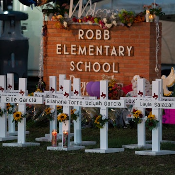 White crosses for those killed in the Robb Elementary mass shooting. A father in a neighboring Texas...