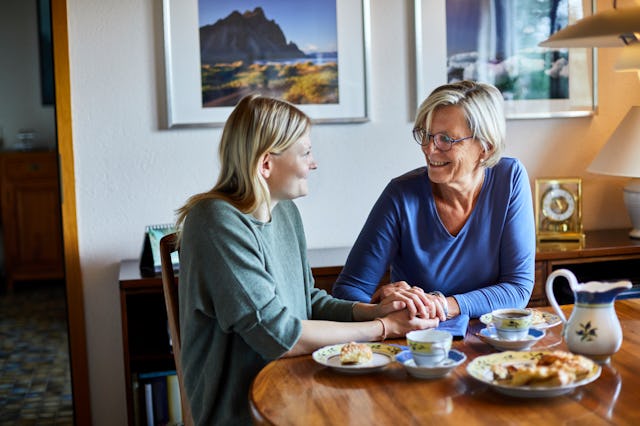 A woman sitting at a table next to her Ex MIL who taught her all the ways not to be a good MIL