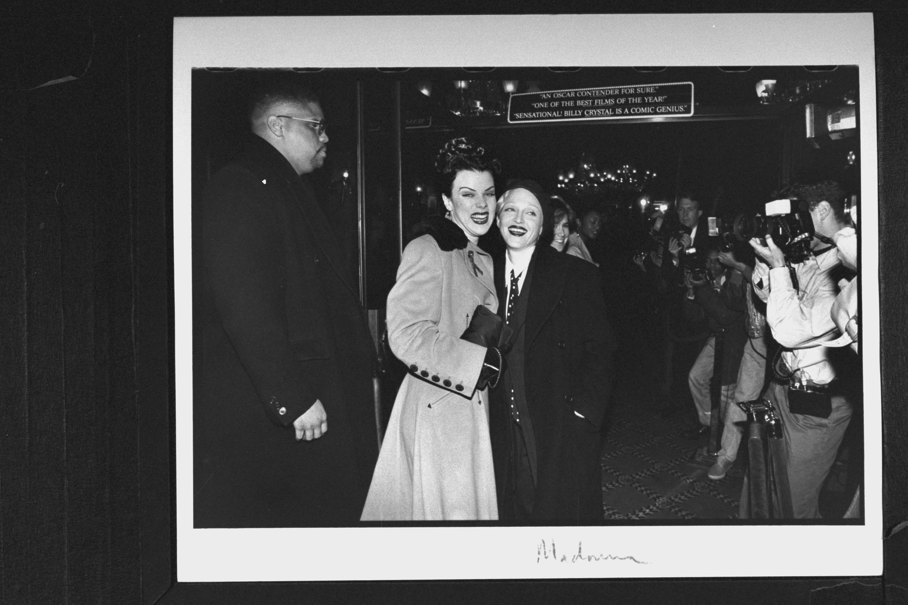 Singer Madonna clad in menswear, greeting actress Debi Mazar, who used to be her makeup artist, as t&hellip;