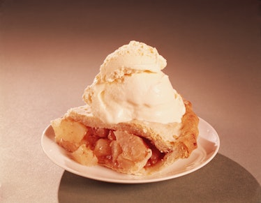 UNITED STATES - CIRCA 1950s:  Slice of apple pie with ice cream. (Photo by H. Armstrong Roberts/Retr...