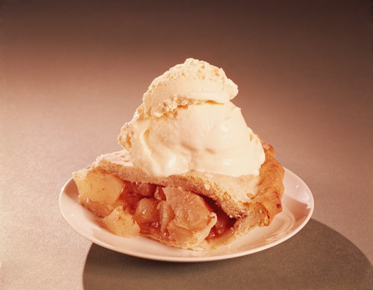 UNITED STATES - CIRCA 1950s:  Slice of apple pie with ice cream. (Photo by H. Armstrong Roberts/Retr...