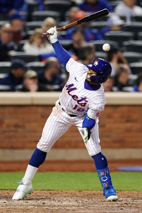 NEW YORK, NEW YORK - MAY 01: Francisco Lindor #12 of the New York Mets reacts as he is hit by a pitc...