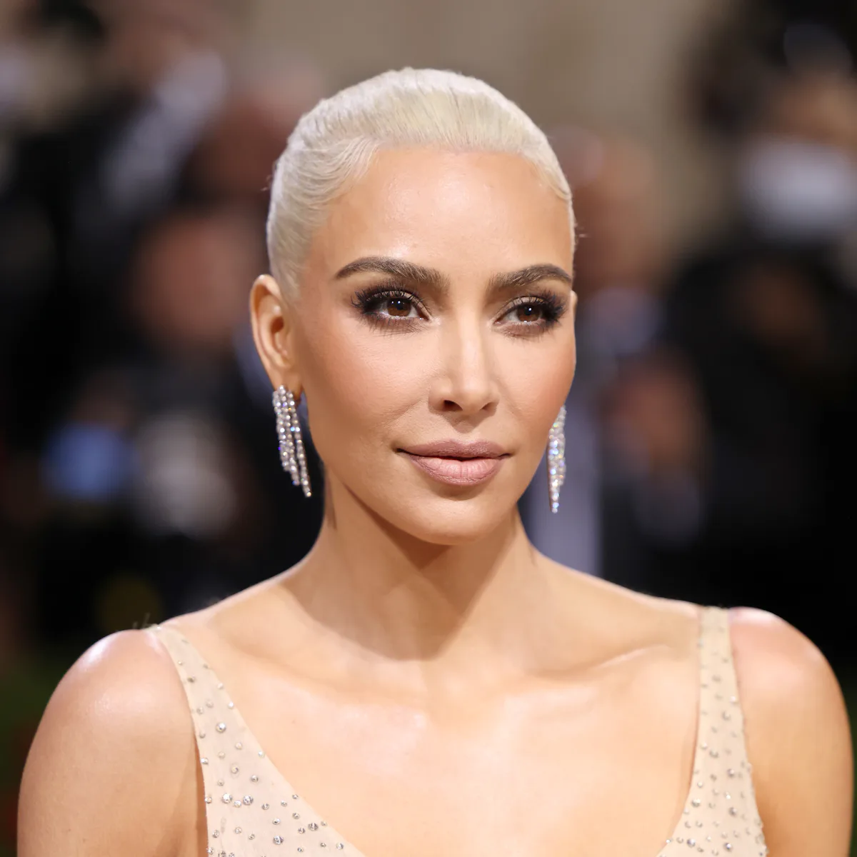 Kim Kardashian's Green Marilyn Monroe Dress Sparks Controversy Kim Kardashian's Green Marilyn Monroe Dress Sparks Controversy