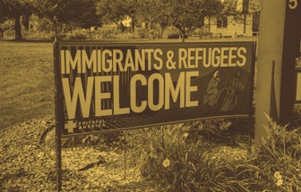 Roseville, Minnesota, Immigrant and refugees welcome sign at local church. (Photo by: Michael Siluk/...