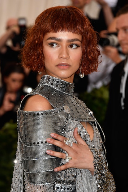 Zendaya's hair evolution included a red bob at the 2018 Met Gala.