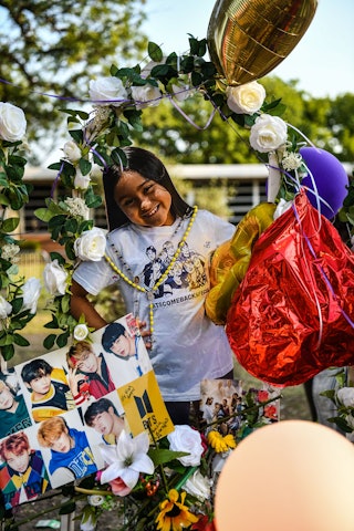 Photo of Amerie Jo Garza, 10, who died in the mass shooting, is placed at a makeshift memorial at Ro...