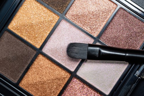 Luxury eyeshadow palette of nine colours. Shimmer eyeshadows for make up artist.