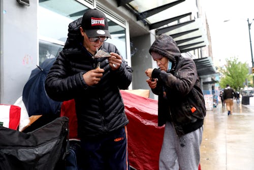 VANCOUVER, BRITISH COLUMBIA - MAY 03: Tyler Dixon, 26, left, of Abbotsford, and Kim Baptiste, 45, of...